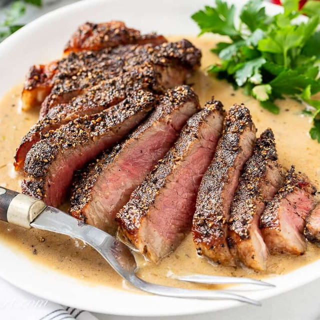 Angus Grass-Fed New York Strip “Au Poivre”.